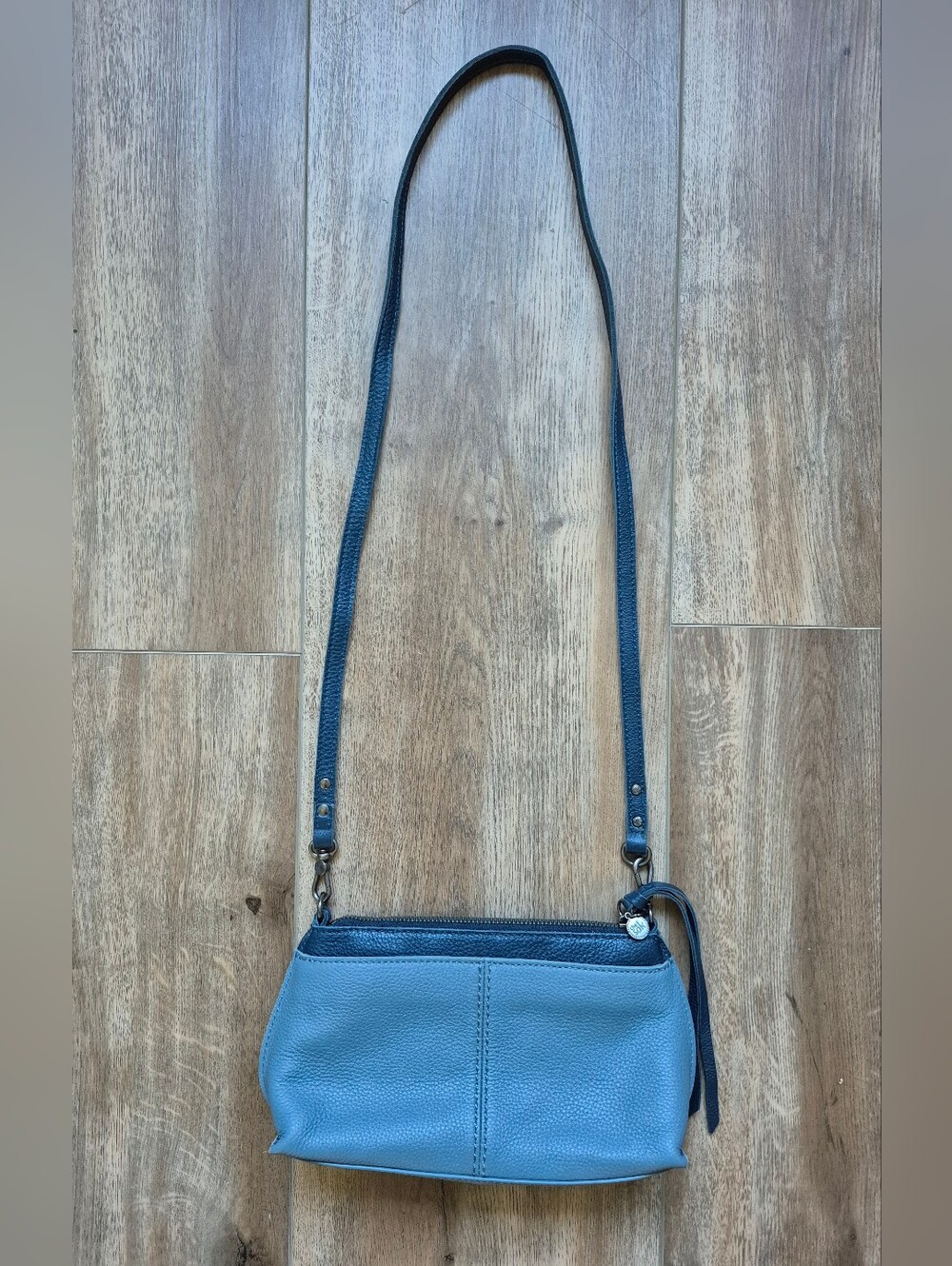 The Sak Compact Blue Leather Crossbody Bag with Adjustable Strap